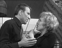 Frank (Alfred Burke) remonstrates with Grace (Heather Canning), after she steals his money.
