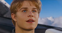 Alan Tracy (Brady Corbet)